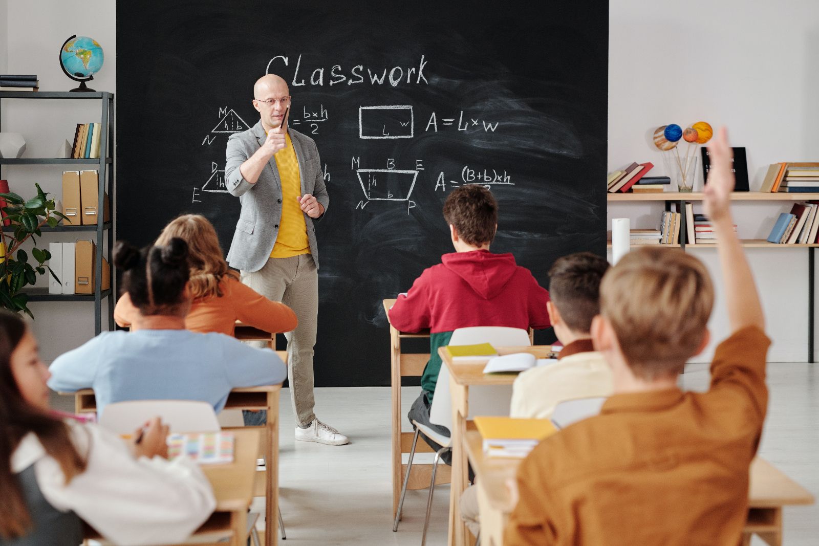 teacher teaching math in the classroom