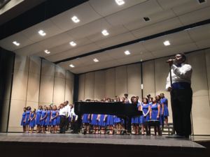 students performing at a choir concert