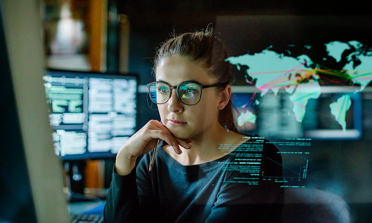 woman sitting at computer